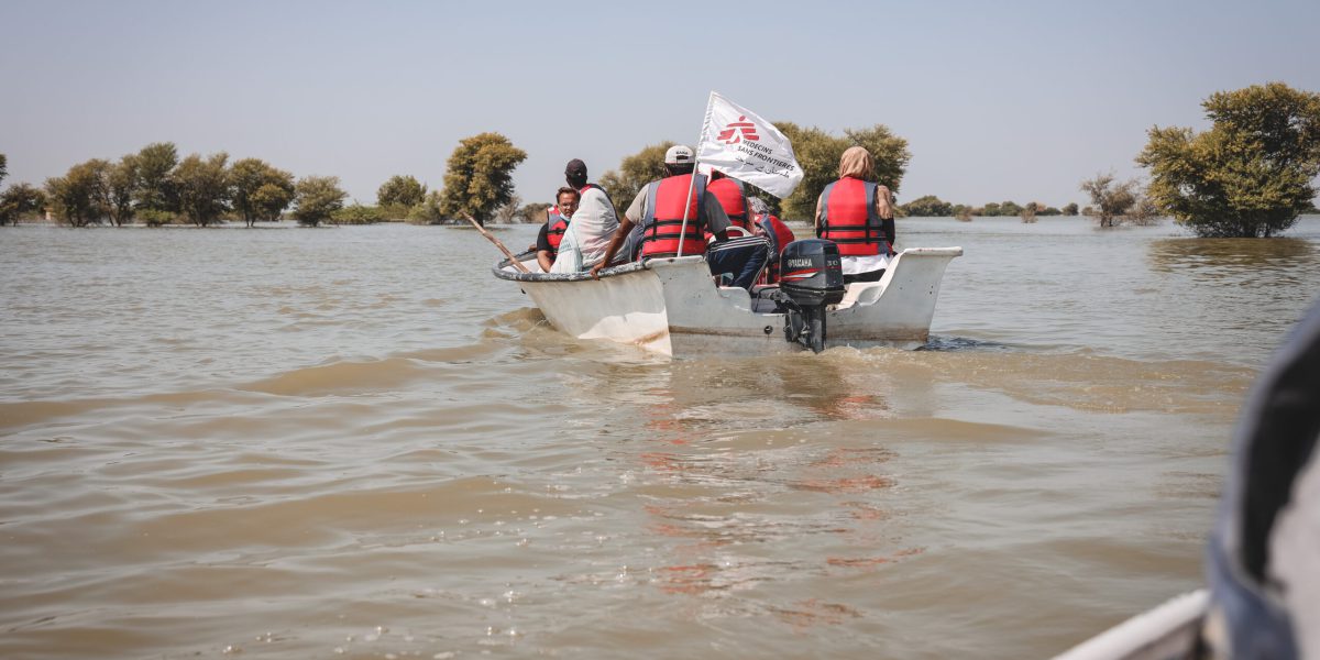 MSF's emergency response team travelling by boat to reach a village in Johi town that is still cut-off by the water. The MSF team has set up a medical camp for flood-affected communities in Johi town, Dadu district.